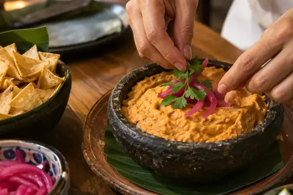 Cómo preparar sikil pak para abrir una cena de inspiración yucateca